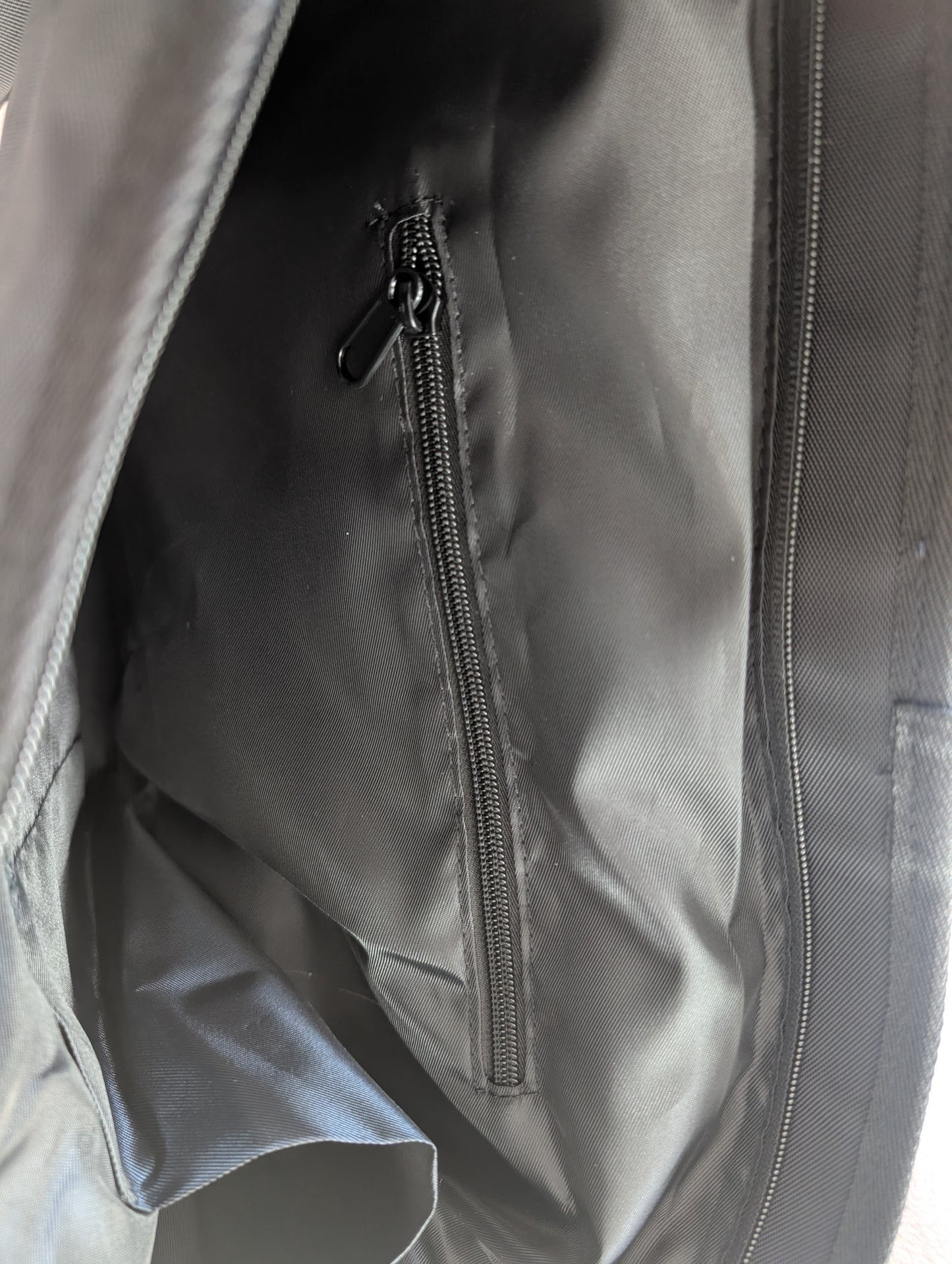 Allaprima Art Black Weather-Resistant Bag with Adjustable Buckle and Shoulder Strap
