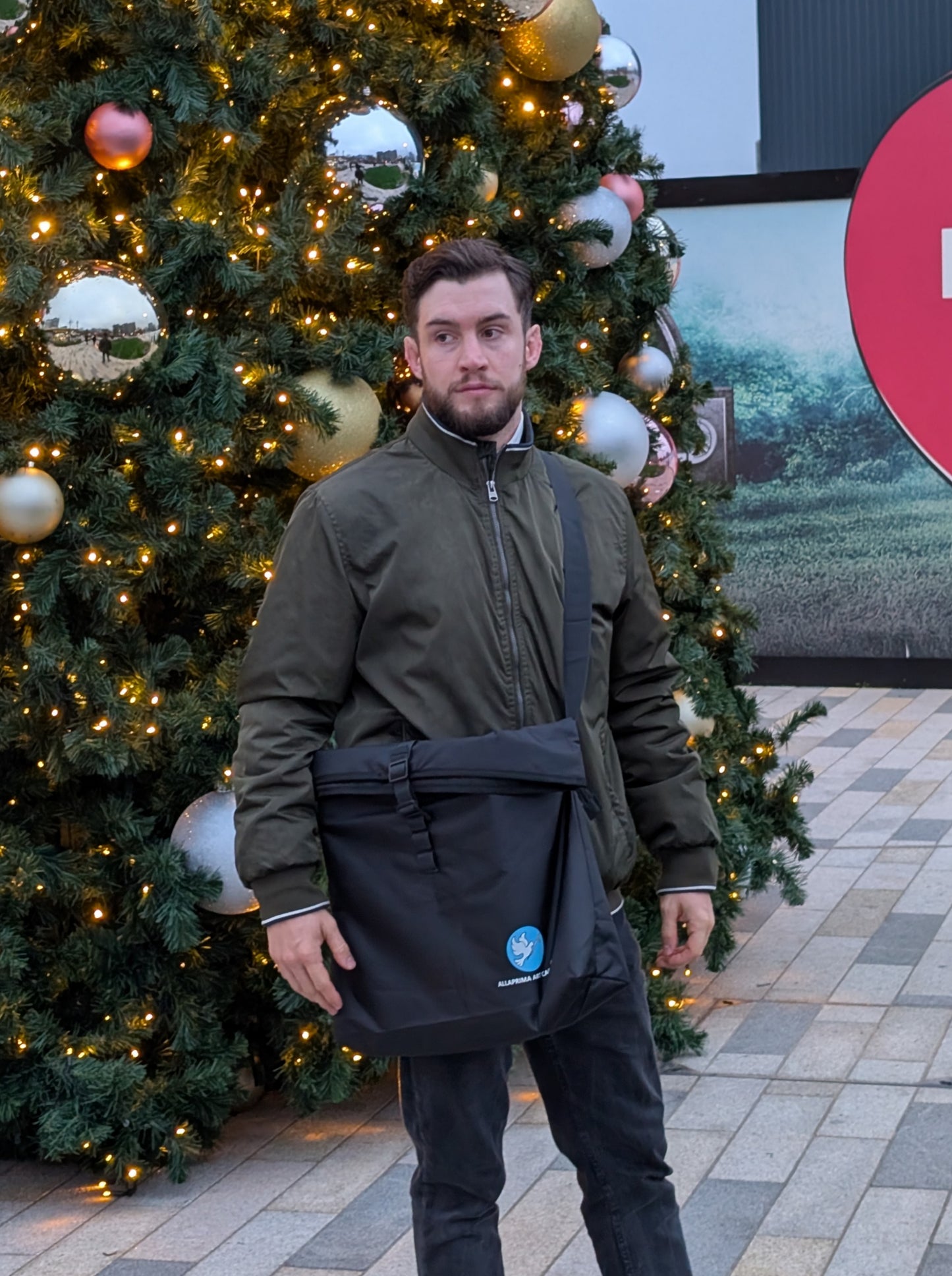 Allaprima Art Black Weather-Resistant Bag with Adjustable Buckle and Shoulder Strap